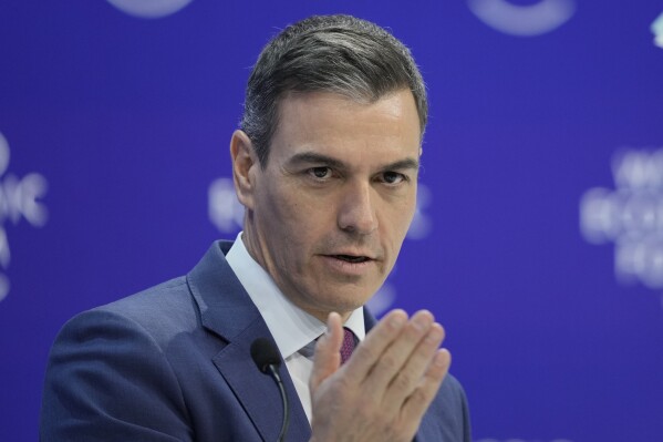 FILE - Pedro Sanchez, Spain's Prime Minister delivers his speech at the Annual Meeting of World Economic Forum in Davos, Switzerland, on Jan. 17, 2024. Sánchez said Saturday March 9, 2024 that he will propose that Spain's parliament recognizes a Palestinian state. (AP Photo/Markus Schreiber, File)