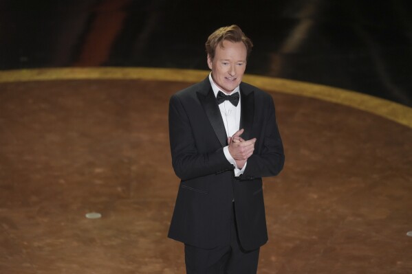 Host Conan O'Brien speaks during the Oscars on Sunday, March 2, 2025, at the Dolby Theatre in Los Angeles. (AP Photo/Chris Pizzello)