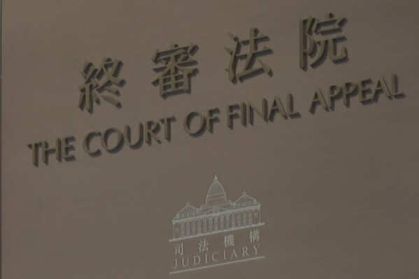 The signage of Hong Kong's Final Court of Appeal is seen at the court in Hong Kong Monday, Aug. 12, 2024. (AP Photo/Katie Tam)