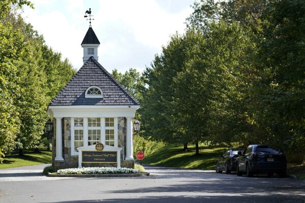 FILE - In this Friday, Oct. 2, 2020, file photo, the entrance to Trump National Golf Club is seen in Bedminster, N.J. The PGA of America voted Sunday, Jan. 10, 2021, to not play the 2022 PGA Championship at the club because of the Trump-fueled insurrection at the Capitol on Wednesday, Jan. 6. (AP Photo/Seth Wenig, File)