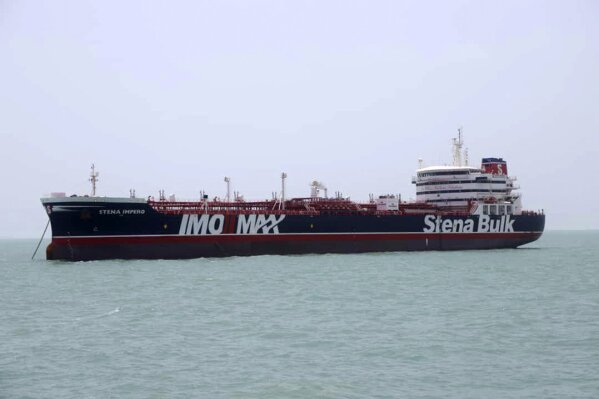 A British-flagged oil tanker Stena Impero which was seized by the Iran's Revolutionary Guard on Friday is photographed in the Iranian port of Bandar Abbas, Saturday, July 20, 2019. The chairman of Britain's House of Commons Foreign Affairs Committee says military action to free the oil tanker seized by Iran would not be a good choice. Tom Tugendhat said Saturday it would be "extremely unwise" to seek a military solution to the escalating crisis, especially because the vessel has apparently been taken to a well-protected port. (Tasnim News Agency/via AP)