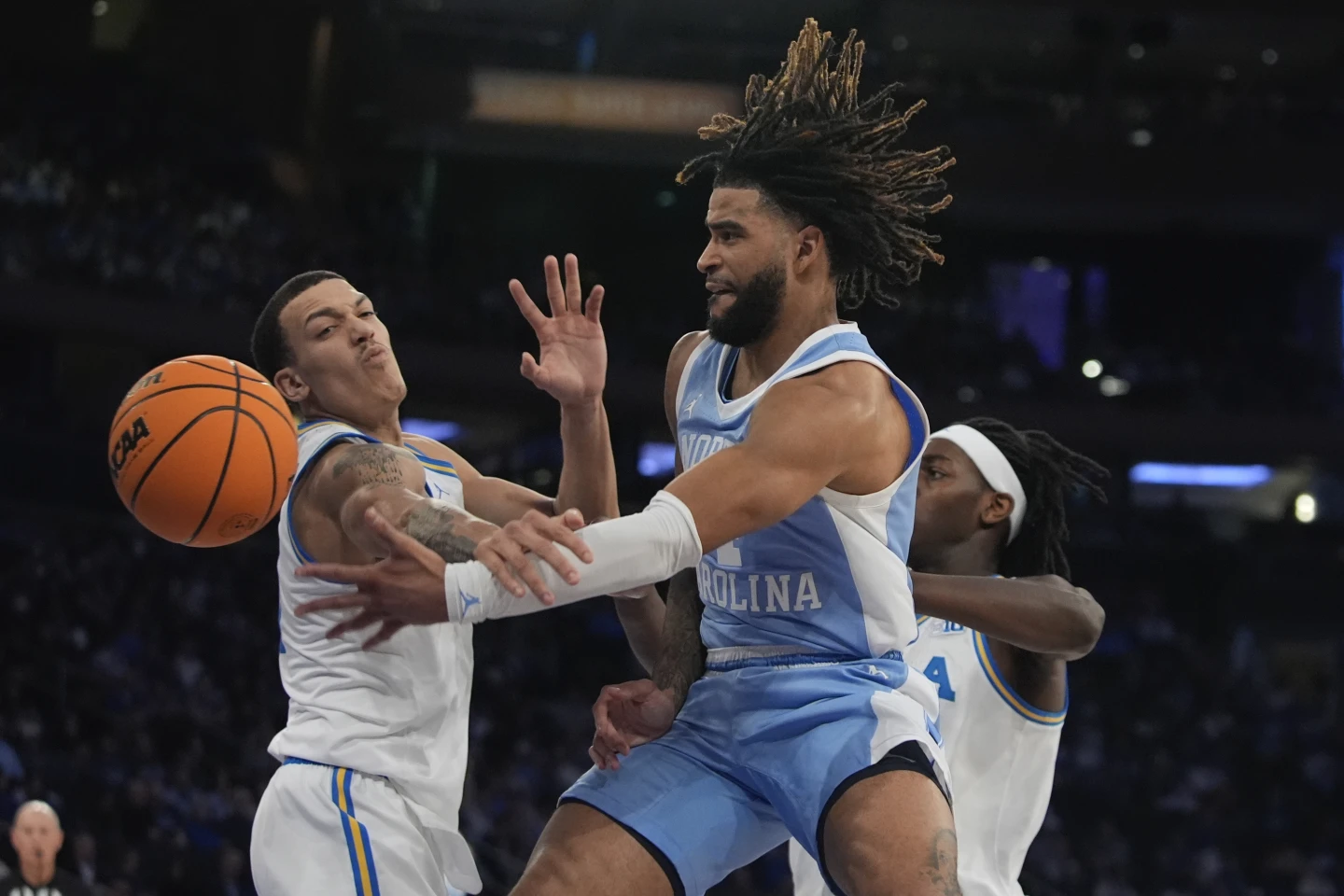 R.J. Davis rallies North Carolina past No. 18 UCLA 76-74 in CBS Sports Classic