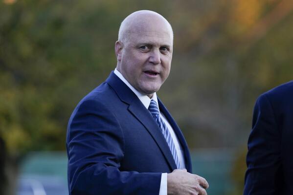 FILE - Former New Orleans Mayor Mitch Landrieu after President Joe Biden signs the $1.2 trillion bipartisan infrastructure bill into law during a ceremony on the South Lawn of the White House in Washington, Monday, Nov. 15, 2021.  As mayor of New Orleans, Mitch Landrieu oversaw billions of dollars in infrastructure repairs and improvements when he took over a lagging recovery from Hurricane Katrina in 2010. Now, he's tasked with infrastructure work on a national scale.(AP Photo/Susan Walsh, File)