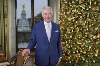 Britain's King Charles III poses for a photo, during the recording of his Christmas message at Buckingham Palace, in London, Saturday, Dec. 7, 2023. (Jonathan Brady/Pool Photo via AP)