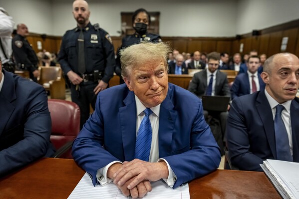 Former President Donald Trump sits in Manhattan Criminal Court during his ongoing hush money trial in New York, Monday, May 20, 2024.  (Pool photo via Mark Peterson/AP)