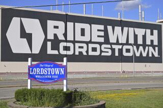 FILE - In this June 22, 2021, file photo, a mural is displayed on the wall outside the Lordstown Motors plant in Lordstown, Ohio. Foxconn Technology Group, the world’s largest electronics maker, has a deal to buy a huge auto assembly plant in Ohio from startup electric truck maker Lordstown Motors, the companies announced Thursday, Sept. 30. (AP Photo/David Dermer, File)