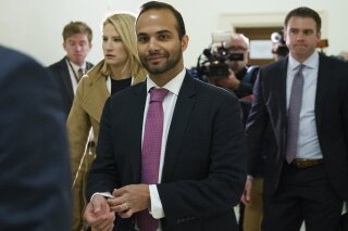 
              FILE - In this Oct. 25, 2018, file photo, George Papadopoulos, the former Trump campaign adviser who triggered the Russia investigation, arrives for his first appearance before congressional investigators, on Capitol Hill in Washington. A judge has rejected an effort by former Trump campaign foreign policy adviser Papadopoulos to delay his two-week prison term and says Papadopoulos must surrender Monday, Nov. 26, as scheduled. (AP Photo/Carolyn Kaster, File)
            