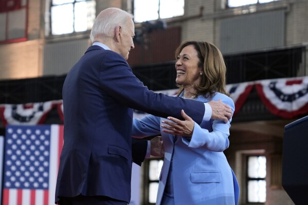 President Joe Biden hugs Vice President Kamala Harris during a campaign event at Girard College, Wednesday, May 29, 2024, in Philadelphia. (AP Photo/Evan Vucci)
