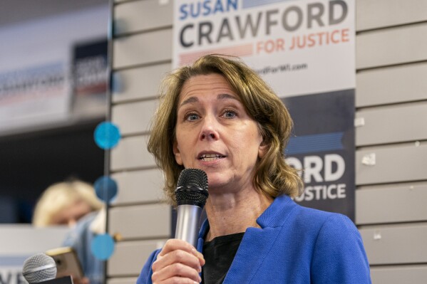 Wisconsin Supreme Court candidate Susan Crawford addresses a crowd Saturday, March 29, 2025 at a campaign stop at a field office for the Democratic Party of Wisconsin, in Milwaukee. (AP Photo/Andy Manis)