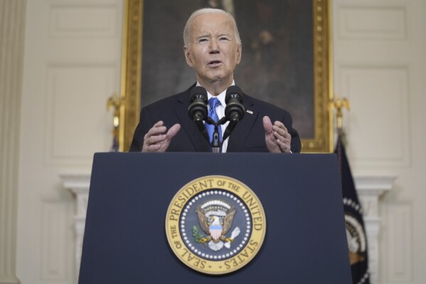FILE - President Joe Biden speaks about a $95 billion aid package that would help Ukraine in their war against Russia, in the State Dining Room of the White House, Feb. 13, 2024, in Washington. (AP Photo/Evan Vucci)