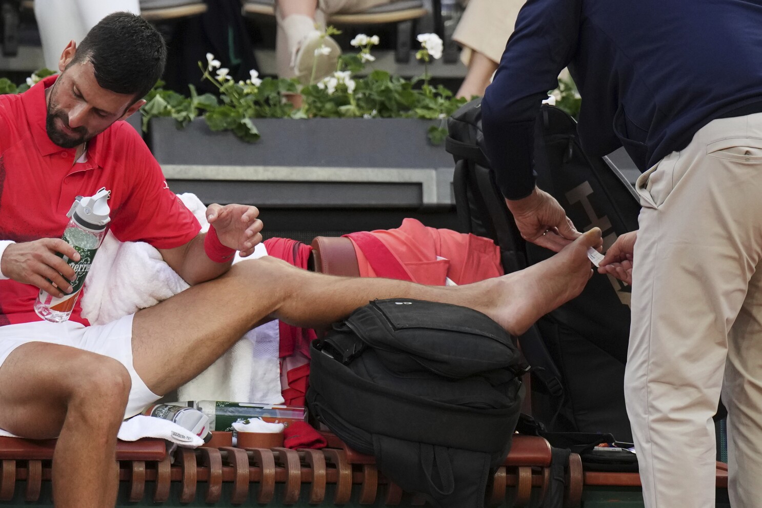 Novak Djokovic gets a toe taped up in French Open win