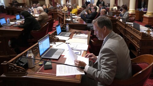 State Sen. Brian Dahle, R-Bieber, works at his desk as legislators work on the state budget at the Capitol in Sacramento, Calif., Tuesday , June 27, 2023. Both houses approved the $310.8 billion spending plan that covers the nearly $32 billion budget deficit without raiding the state's saving account. (AP Photo/Rich Pedroncelli)