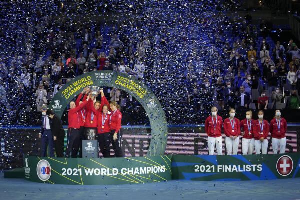 Team of Russia celebrates after winning their Billie Jean King Cup final tennis match against Switzerland in Prague, Czech Republic, Saturday, Nov. 6, 2021. (AP Photo/Petr David Josek)