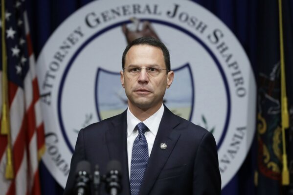 
              FILE - In this Aug. 14, 2018, file photo, Pennsylvania Attorney General Josh Shapiro speaks about a grand jury’s report on clergy abuse in the Roman Catholic Church during a news conference at the Capitol in Harrisburg, Pa. The U.S. Justice Department opened their own investigation and have served subpoenas on dioceses across the state, according to multiple sources who spoke to The Associated Press on condition of anonymity. The subpoenas follow the state grand jury report. (AP Photo/Matt Rourke, File)
            