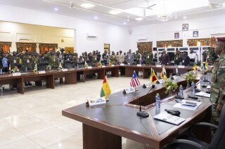 FILE - The defense chiefs from the Economic Community of West African States (ECOWAS) countries excluding Mali, Burkina Faso, Chad, Guinea and Niger, gather for their extraordinary meeting in Accra, Ghana, Thursday, Aug. 17, 2023, to discuss the situation in Niger. Three West African nations of Mali, Burkina Faso and Niger have quit the regional economic bloc known as ECOWAS. Their respective juntas said in a joint statement on Sunday, Jan. 28, 2024 thatt he bloc has imposed “inhumane” sanctions to reverse the coups in their nations and has also “moved away from the ideals of its founding fathers and Pan-Africanism” after nearly 50 years of its establishment. (AP Photo/Richard Eshun Nanaresh, File)