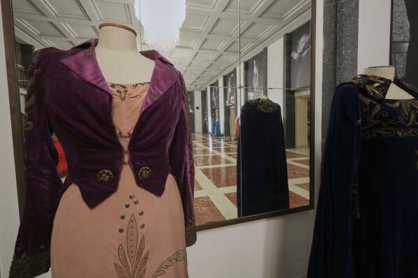 Historical costumes from Giacomo Puccini's "Tosca" opera are on display inside the foyer of the "Teatro dell' Opera" opera house, in Rome, Thursday, April 10, 2025. (AP Photo/Andrew Medichini)