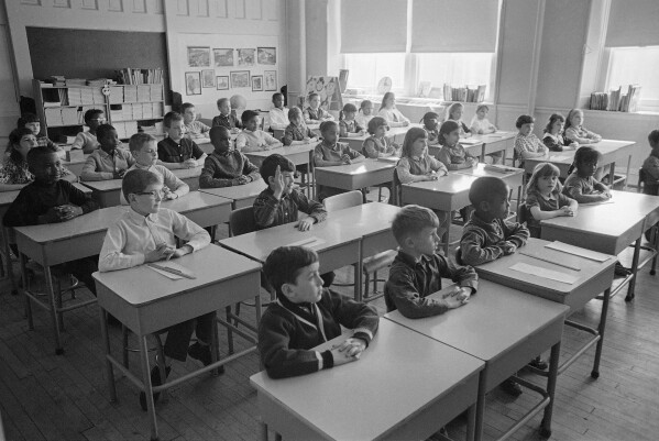 FILE - Children in class together at a school in Philadelphia, PA, April 13, 1967. Seventy years after the Supreme Court's Brown v. Board, America is both more diverse — and more segregated. (AP Photo, File)