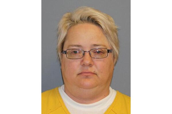 FILE - In this photo released July 13, 2022, by the Mesa County Sheriff's Office is Sandra Brown. The former elections manager accused of helping a Colorado clerk charged with tampering with voting equipment plans to plead guilty under an agreement with prosecutors. Brown is scheduled to be in court Wednesday, Nov. 30, 2022. (Mesa County Sheriff's Office via AP, File)