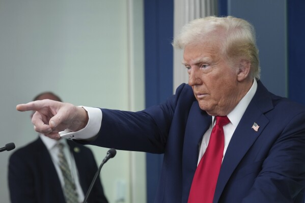 President Donald Trump takes questions while speaking with reporters in the James Brady Press Briefing Room at the White House, Thursday, Jan. 30, 2025, in Washington. (AP Photo/Jacquelyn Martin)