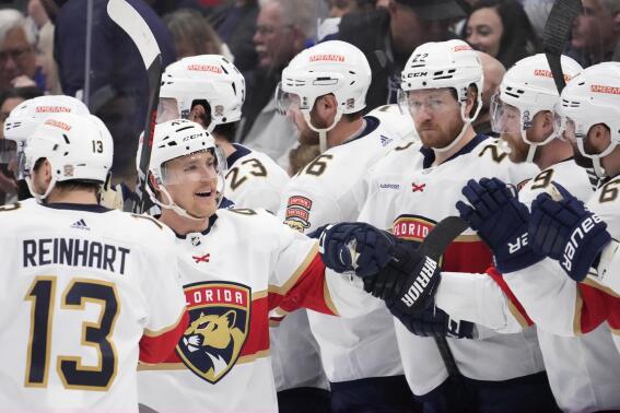 Florida Panthers defenseman Gustav Forsling (42) celebrates with teammates after scoring past Toronto Maple Leafs goaltender Ilya Samsonov (35) during the second period in Game 2 of an NHL hockey Stanley Cup second-round playoff series in Toronto, Thursday, May 4, 2023. (Frank Gunn/The Canadian Press via AP)