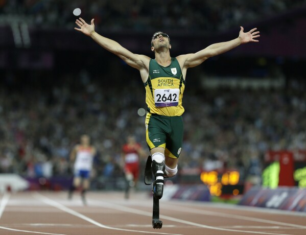 FILE - In this Sept. 8, 2012 file photo, South Africa's Oscar Pistorius wins gold in the men's 400-meter T44 final at the 2012 Paralympics in London. (AP Photo/Kirsty Wigglesworth, File)