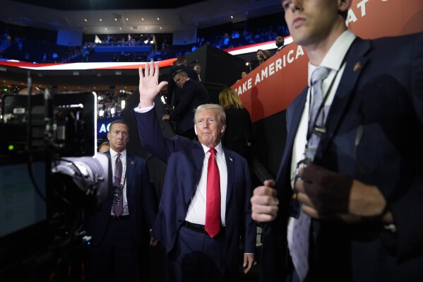 Republican presidential candidate former President Donald Trump arrives on the first day of the Republican National Convention, Monday, July 15, 2024, in Milwaukee. (AP Photo/Evan Vucci)