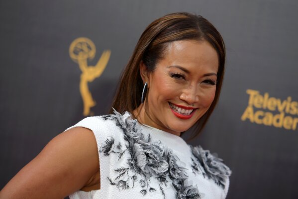 
              FILE - In this Sept. 11, 2016, file photo, Carrie Ann Inaba arrives at night two of the Creative Arts Emmy Awards at the Microsoft Theater in Los Angeles. Inaba is no longer a temp on “The Talk.” The CBS daytime show announced Wednesday, Jan. 2, 2019, that Inaba has joined the panel of hosts, moving up from recurring guest host. (Photo by Richard Shotwell/Invision/AP, File)
            