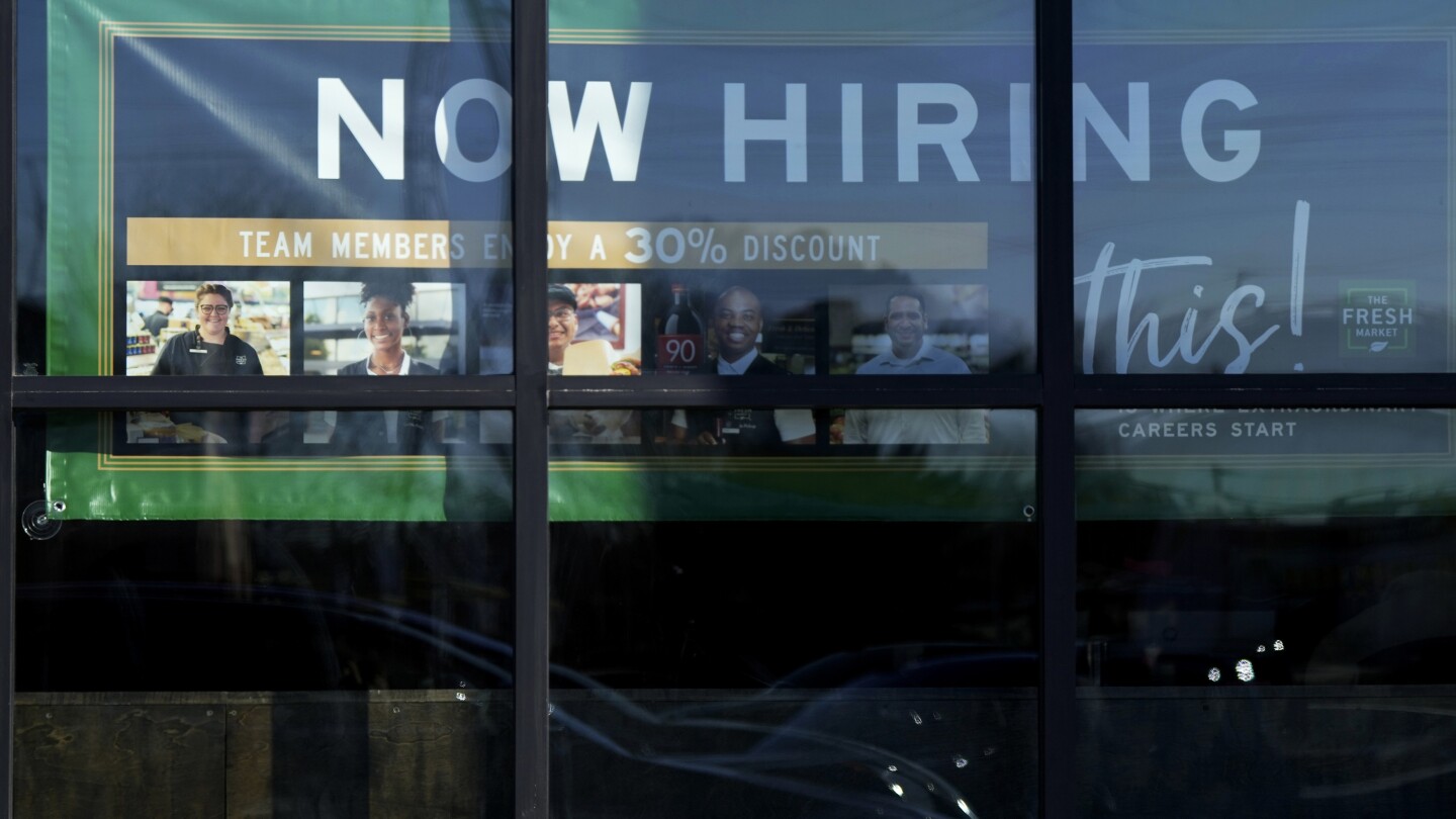 The number of Americans filing for jobless benefits last week rises to highest level in eight months
