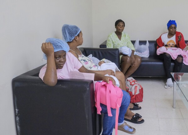 Women who recently gave birth wait for medical attention at the Nuestra Señora de la Altagracia Maternity Hospital in Santo Domingo, Dominican Republic, Sunday, Dec. 10, 2023. The Dominican Republican criminalizes abortion without exceptions and women face up to 2 years in prison for having an abortion. Penalties for doctors or midwives range from 5 to 20 years. (AP Photo/Ricardo Hernandez)