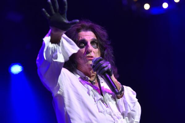 FILE - Alice Cooper performs in Chicago on  July 21, 2019. The rock icon spent his down time during the  COVID-19  pandemic with his family in Phoenix, developing an unlikely new skill — tap dancing. (Photo by Rob Grabowski/Invision/AP, File)