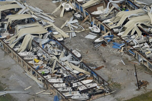 A boat storage facility is destroyed Thursday, Aug. 27, 2020, after Hurricane Laura went through the area near Lake Charles, La. (AP Photo/David J. Phillip)