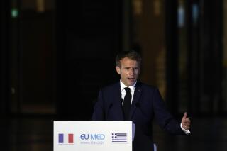 French President Emmanuel Macron makes statements during the EUMED 9 summit at the Stavros Niarchos Foundation Cultural Center in Athens, Friday, Sept. 17, 2021.The leaders of Europe's Mediterranean countries pledged Friday to expand cooperation against climate change, at a meeting in Athens held in the aftermath of massive wildfires that ravaged parts of southern Europe. (AP Photo/Thanassis Stavrakis)