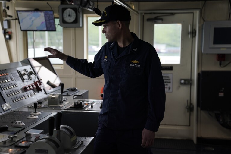 Captain Colin Little explains how he controls the NOAA Okeanos Explorer during a tour, Friday, June 23, 2023, in Kodiak, Alaska. (AP Photo/Joshua A. Bickel)