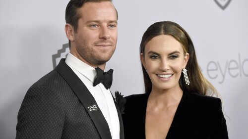 FILE - Armie Hammer, left, and wife Elizabeth Chambers arrive at the InStyle and Warner Bros. Golden Globes afterparty, Jan. 7, 2018, in Beverly Hills, Calif. Hammer has reached a divorce agreement with Chambers, nearly three years after she filed to end their marriage. Hammer's attorney filed documents in Los Angeles Superior Court on Tuesday, June 20, 2023, informing a judge that the actor and Chambers have come to terms over child custody, child support, spousal support and division of assets. (Photo by Chris Pizzello/Invision/AP, File)