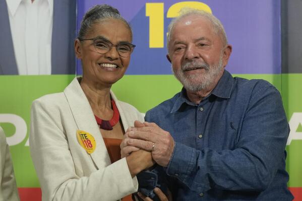 FILE - Brazil's former President Luiz Inacio Lula da Silva, right, and congressional candidate Marina Silva, campaign in Sao Paulo, Brazil, Monday, Sept. 12, 2022. Environmentalists, Indigenous people and voters sympathetic to their causes were important to Lula's narrow victory over former President Jair Bolsonaro. Now Lula is seeking to fulfill campaign pledges he made to them on a wide range of issues, from expanding Indigenous territories to halting a surge in illegal deforestation. (AP Photo/Andre Penner, file)