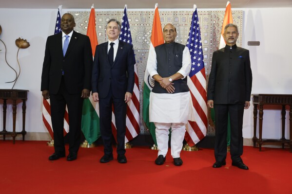 U.S. Defense Secretary Lloyd Austin, from left, Secretary of State Antony Blinken, India's Defense Minister Rajnath Singh and Foreign Minister Subrahmanyam Jaishankar pose for a photo as part of the so-called 