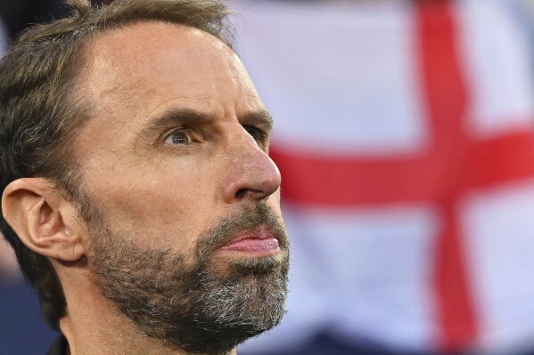 England's manager Gareth Southgate looks up prior to a Group C match between Serbia and England at the Euro 2024 soccer tournament in Gelsenkirchen, Germany, Sunday, June 16, 2024. (Bernd Thissen/dpa via AP)