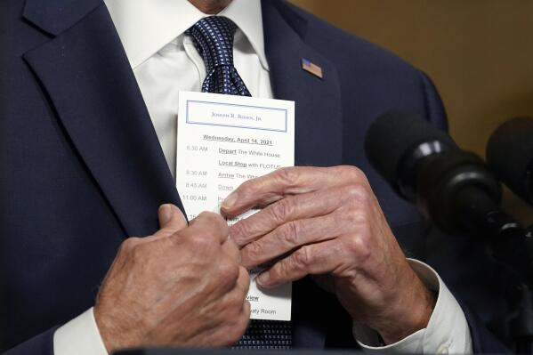 FILE - In this April 14, 2021, file photo President Joe Biden puts a card into his pocket as he speaks from the Treaty Room in the White House about the withdrawal of the remainder of U.S. troops from Afghanistan. (AP Photo/Andrew Harnik, Pool, File)