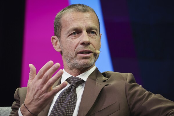 UEFA President Aleksander Ceferin speaks at a panel discussion as part of the SPOBIS Conference 2024 in Hamburg, Gemany, Wedesday, Jan. 31, 2024. (Christian Charisius/dpa via AP)