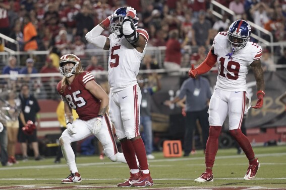 New York Giants linebacker Kayvon Thibodeaux (5) reacts after being called for a penalty during the second half of an NFL football game against the San Francisco 49ers in Santa Clara, Calif., Thursday, Sept. 21, 2023. (AP Photo/Godofredo A. Vásquez)