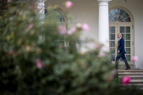 President Joe Biden walks along the Colonnade towards the Oval Office after pardoning the national Thanksgiving turkeys, Liberty and Bell, during a ceremony on the South Lawn of the White House in Washington, Monday, Nov. 20, 2023. Biden celebrated his 81st birthday on Monday by joking repeatedly about his advanced age. At the same time, the White House is strongly defending his stamina and playing down polling, suggesting that the issue could cost him votes during next year’s election. Biden is the oldest president in U.S. history. (AP Photo/Andrew Harnik)