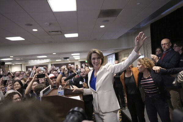 Wisconsin Supreme Court candidate Susan Crawford waves during her election night party after winning the election Tuesday, April 1, 2025, in Madison, Wis. (AP Photo/Kayla Wolf)