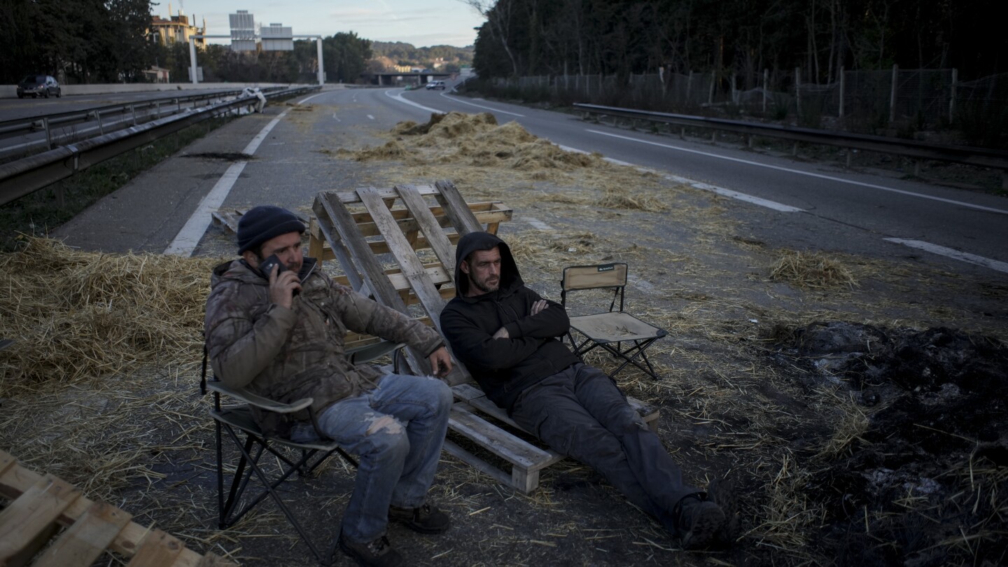 France’s government prepares new measures to calm farmers’ protests, with barricades squeezing Paris