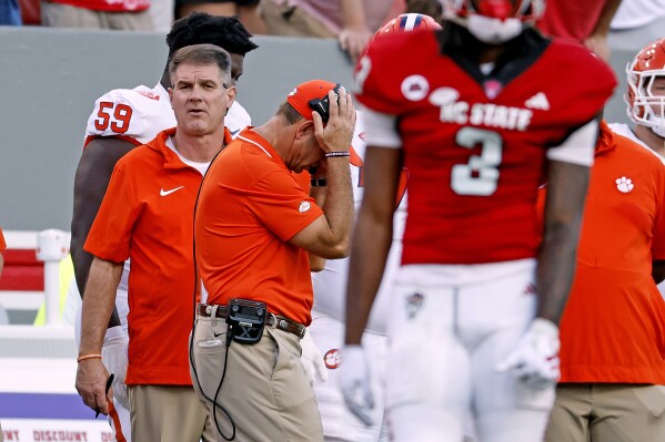 Clemson head coach Dabo Swinney reacts along the sideline during the second half of an NCAA college football game against North Carolina State in Raleigh, N.C., Saturday, Oct. 28, 2023. (AP Photo/Karl B DeBlaker)