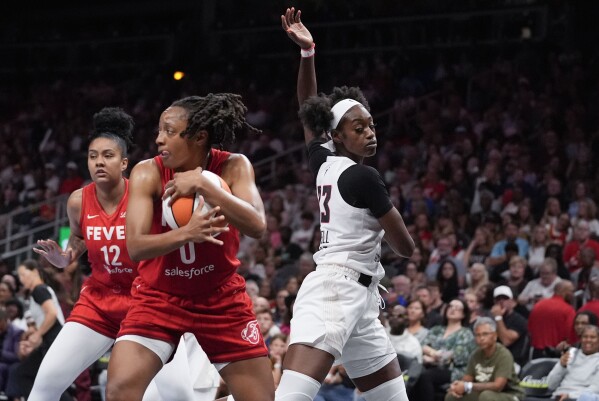Kelsey Mitchell becomes strong complement to Caitlin Clark, and they have  the Fever in the playoffs | AP News