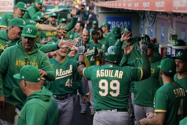 A's hit 5 home runs, rally for 11-10 win over Angels in 10 - The