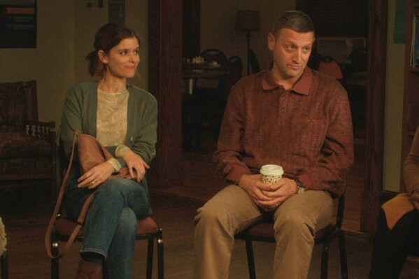 This image released by A24 shows Kate Mara, left, and Tim Robinson in a scene from 