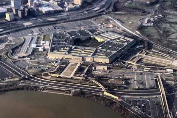 FILE - The Pentagon is seen in this aerial view made through an airplane window in Washington, Jan. 26, 2020. U.S. officials tell The Associated Press the number of reported sexual assaults across the military inched up by about 1% last year, as a sharp decline in Army numbers offset large increases in the other three services. (AP Photo/Pablo Martinez Monsivais, File)