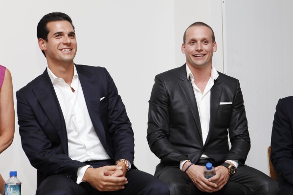 Oren Alexander and Tal Alexander speak at a panel at the Rockstars of Real Estate Event, Tuesday, Sept. 3, 2013 in New York. (Photo by Amy Sussman/Invision for DETAILS Magazine/AP Images, File)