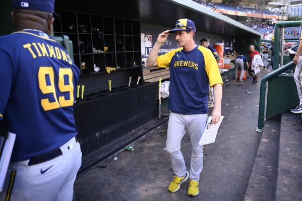Milwaukee Brewers manager Craig Counsell walks in the dugout after a baseball game against the Washington Nationals, Sunday, June 12, 2022, in Washington. (AP Photo/Nick Wass)